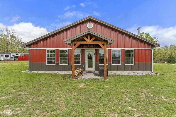 30 Acres of Land with Home for Sale in Windyville, Missouri