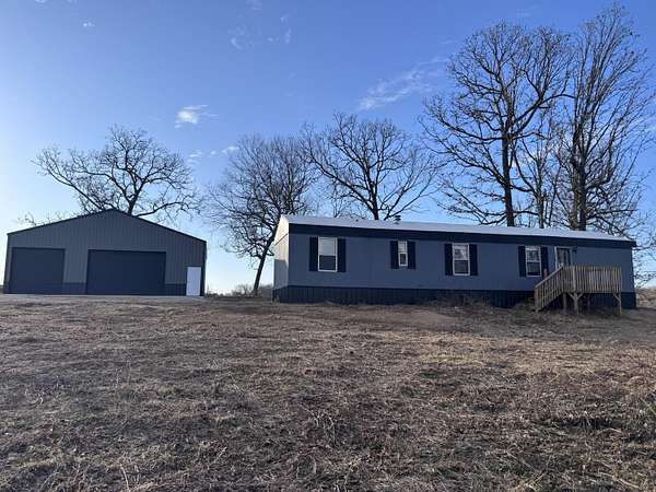 20 Acres of Land with Home for Sale in Crane, Missouri