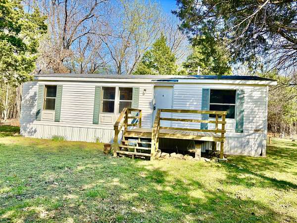 1.5 Acres of Land with Home for Sale in Cedarcreek, Missouri