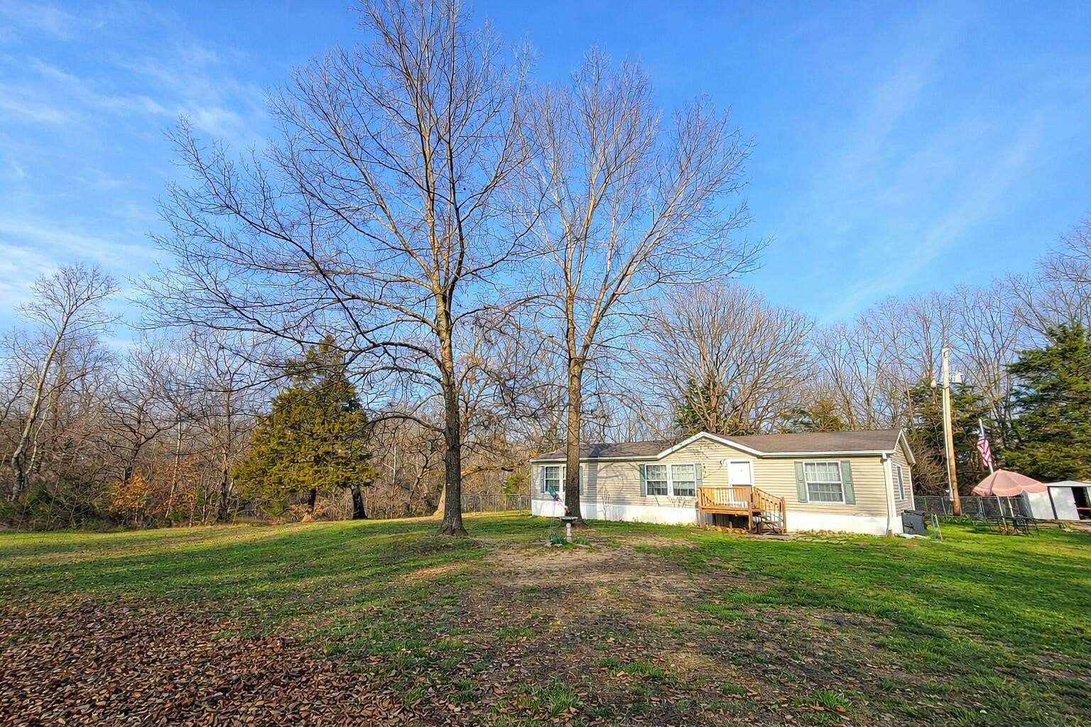 3 Acres of Land with Home for Sale in Wheatland, Missouri