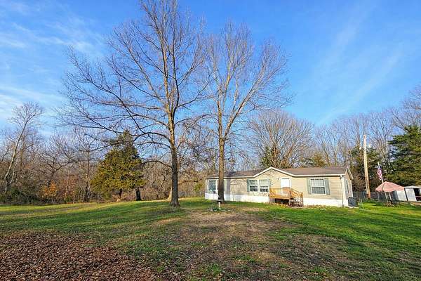 3 Acres of Land with Home for Sale in Wheatland, Missouri
