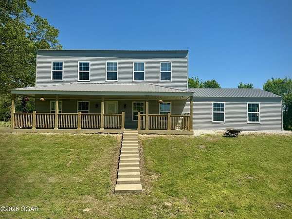 9.84 Acres of Land with Home for Sale in Neosho, Missouri