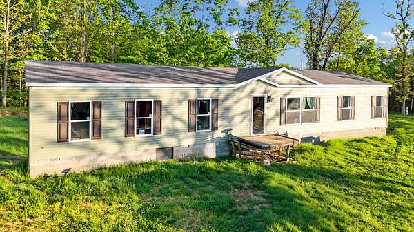 7.3 Acres of Land with Home for Sale in Washburn, Missouri