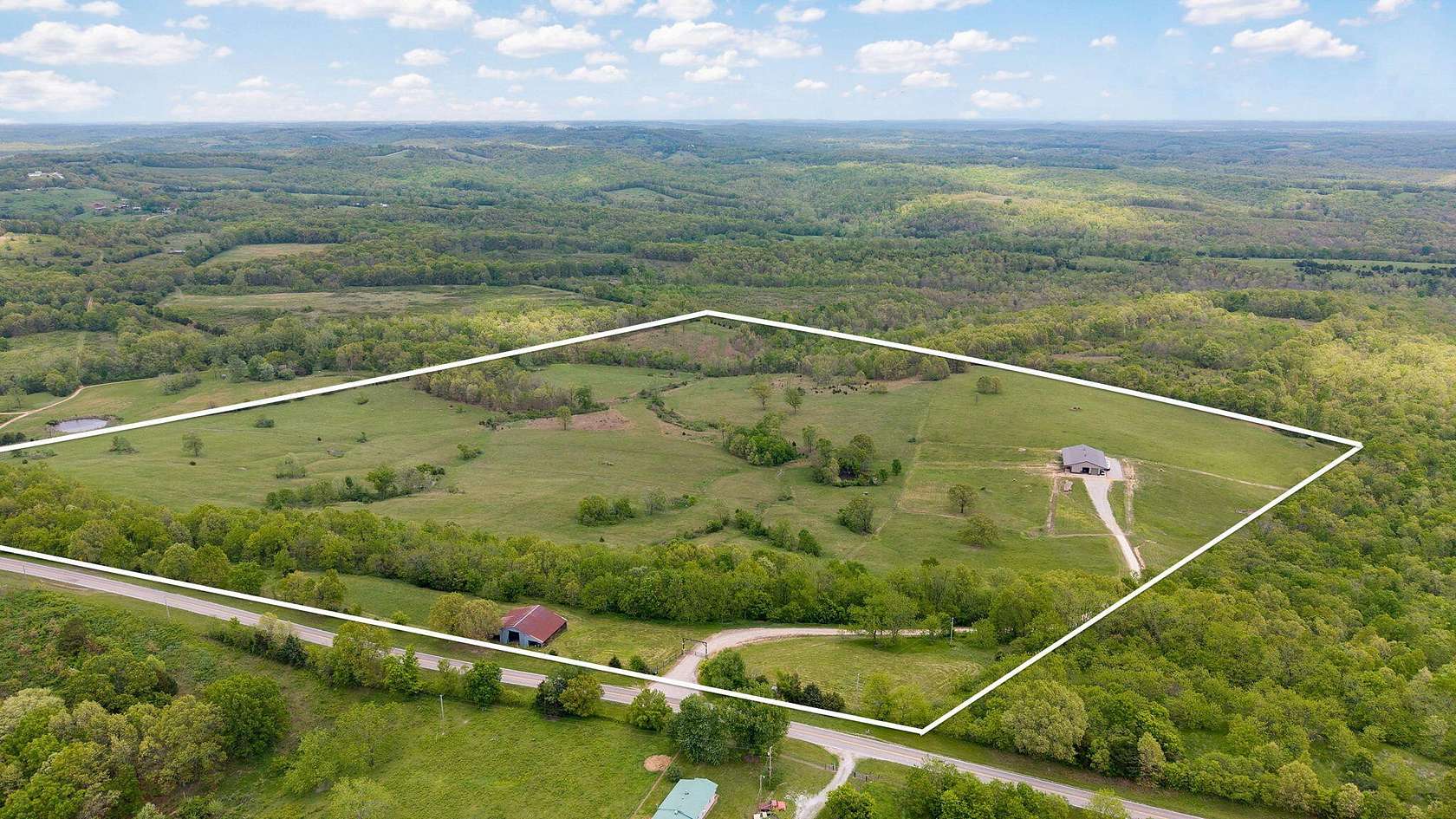 102 Acres of Land with Home for Sale in Oldfield, Missouri