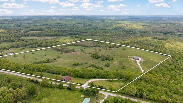 102 Acres of Land with Home for Sale in Oldfield, Missouri