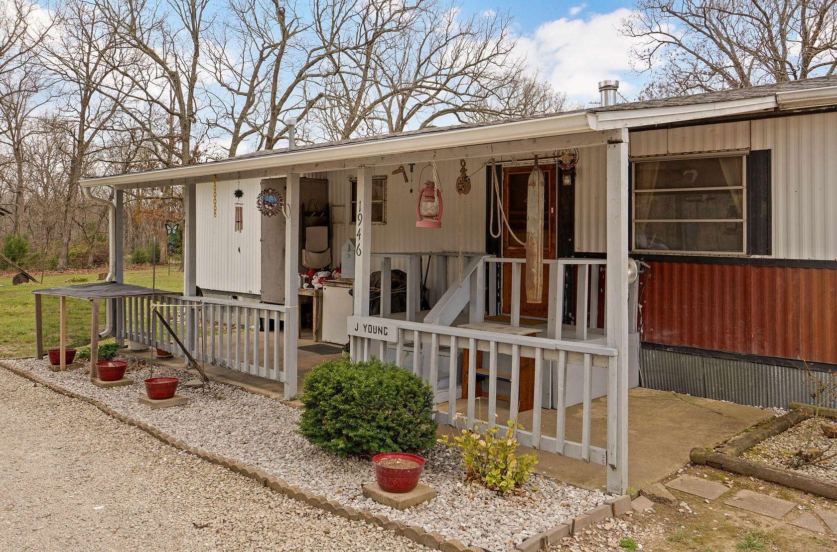 10 Acres of Land with Home for Sale in Pleasant Hope, Missouri