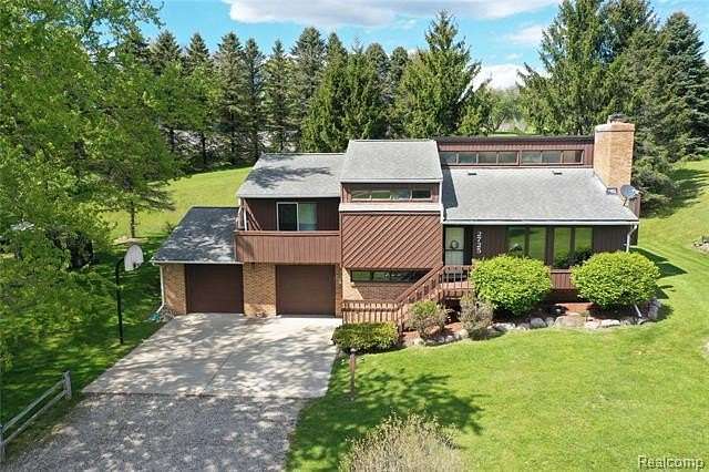 4.78 Acres of Land with Home for Sale in Highland Township, Michigan