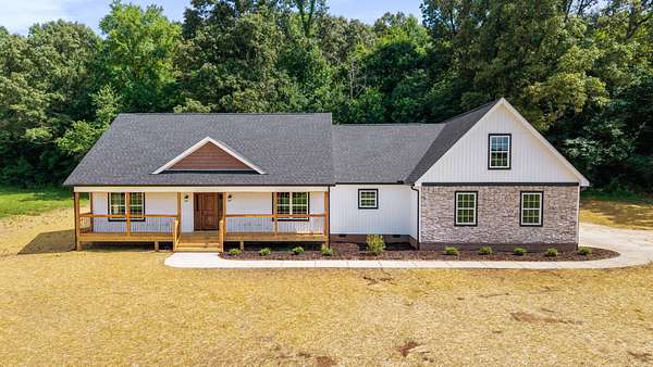 15.8 Acres of Land with Home for Sale in Delano, Tennessee