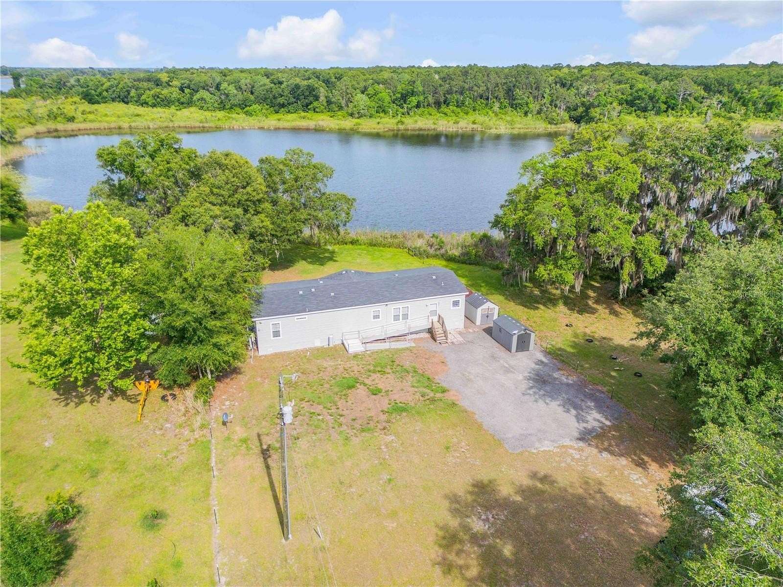 3.2 Acres of Land with Home for Sale in Crescent City, Florida
