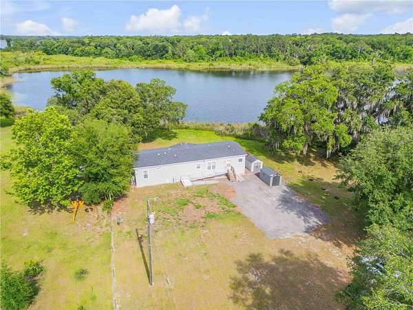 3.2 Acres of Land with Home for Sale in Crescent City, Florida