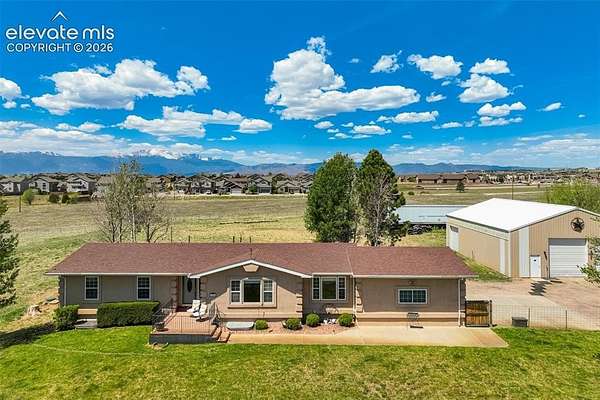 10.6 Acres of Land with Home for Sale in Colorado Springs, Colorado