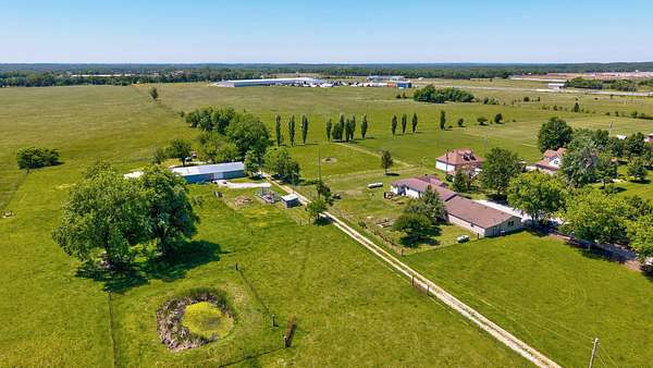 5.16 Acres of Land with Home for Sale in Bolivar, Missouri