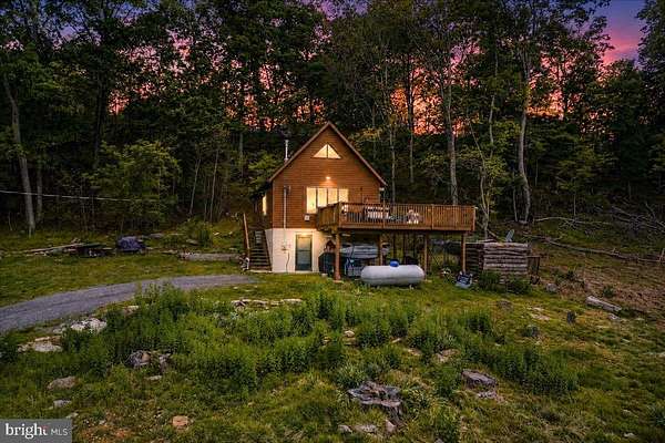 5.82 Acres of Land with Home for Sale in Great Cacapon, West Virginia