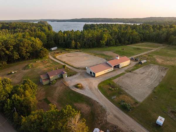 8.1 Acres of Land with Home for Sale in China, Maine
