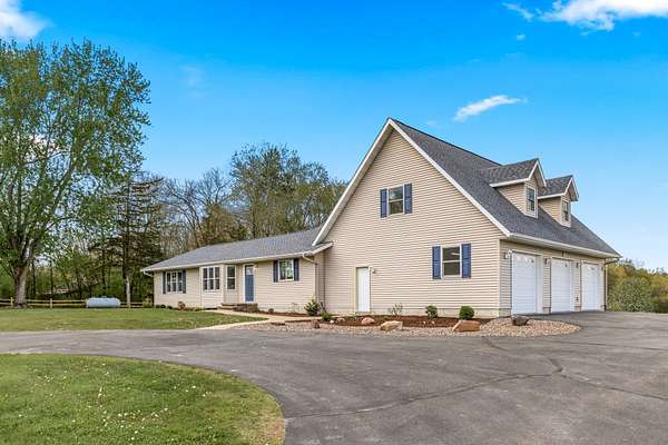 9.4 Acres of Land with Home for Sale in Chippewa Falls, Wisconsin
