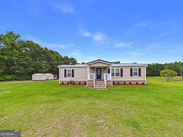 7.37 Acres of Land with Home for Sale in Perry, Georgia