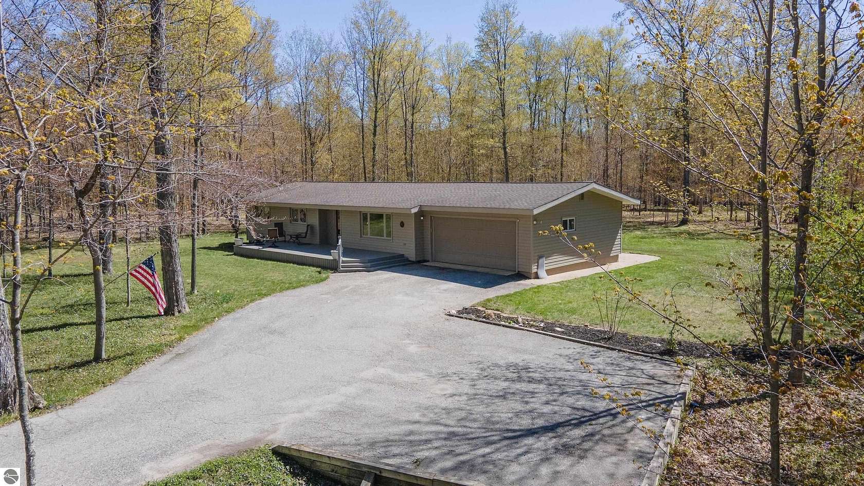 5 Acres of Land with Home for Sale in Maple City, Michigan