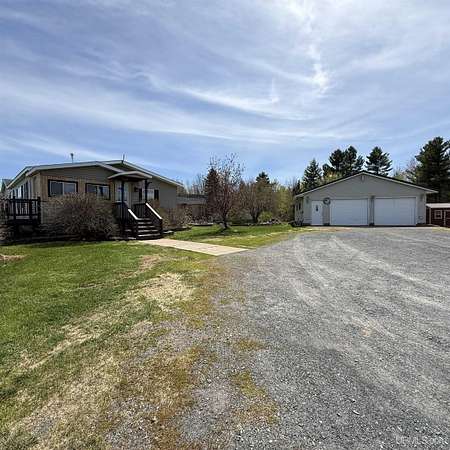 62 Acres of Land with Home for Sale in Saxon Town, Wisconsin