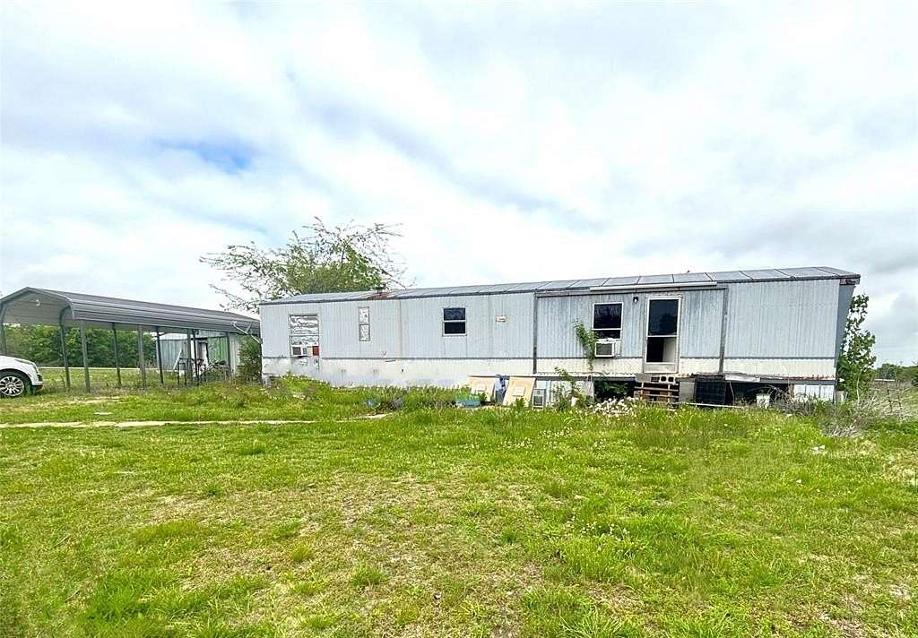 1.54 Acres of Land with Home for Sale in Paris, Texas
