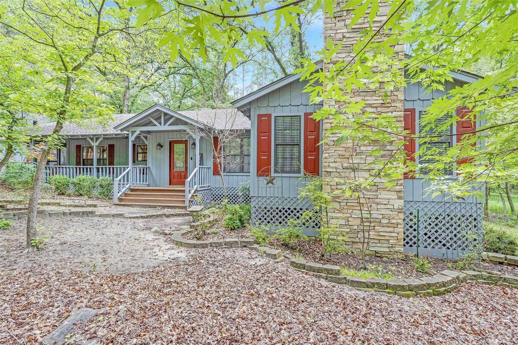 1.69 Acres of Land with Home for Sale in Holly Lake Ranch, Texas