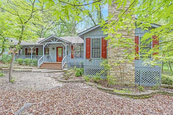1.69 Acres of Land with Home for Sale in Holly Lake Ranch, Texas