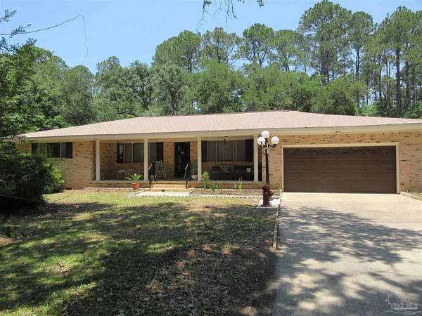 2.88 Acres of Land with Home for Sale in Milton, Florida