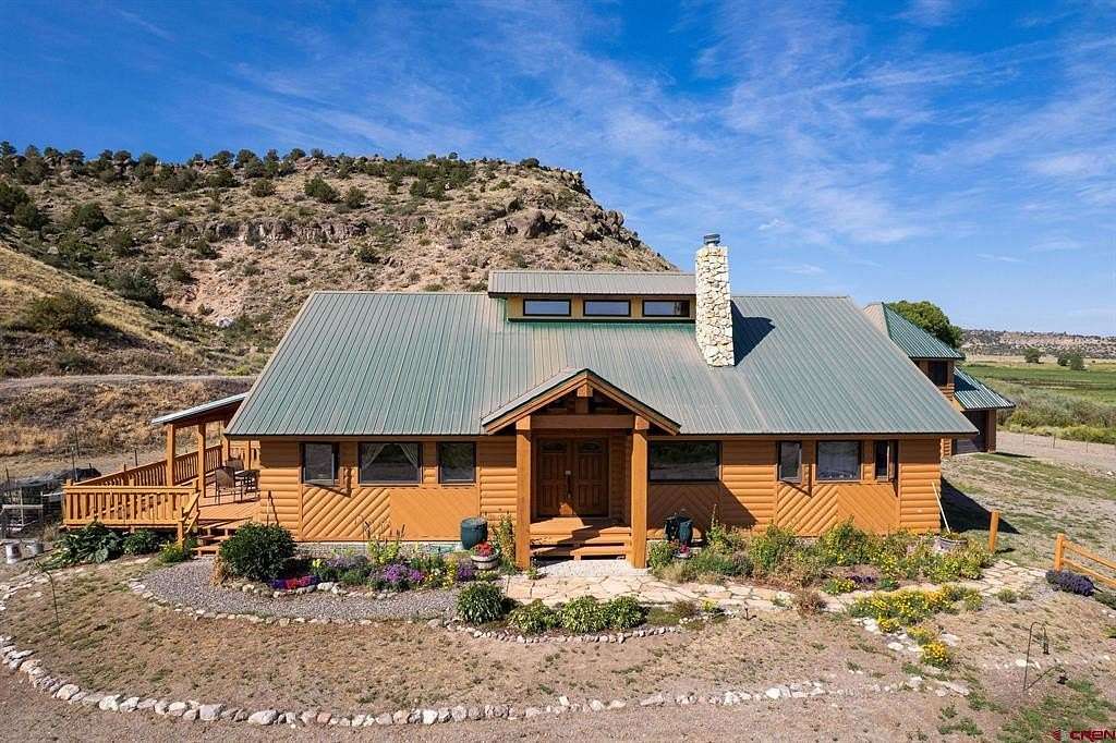 21.8 Acres of Land with Home for Sale in Del Norte, Colorado