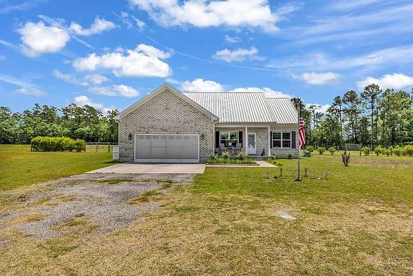 2.69 Acres of Land with Home for Sale in Loris, South Carolina