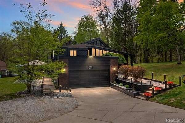 5 Acres of Land with Home for Sale in Groveland Township, Michigan