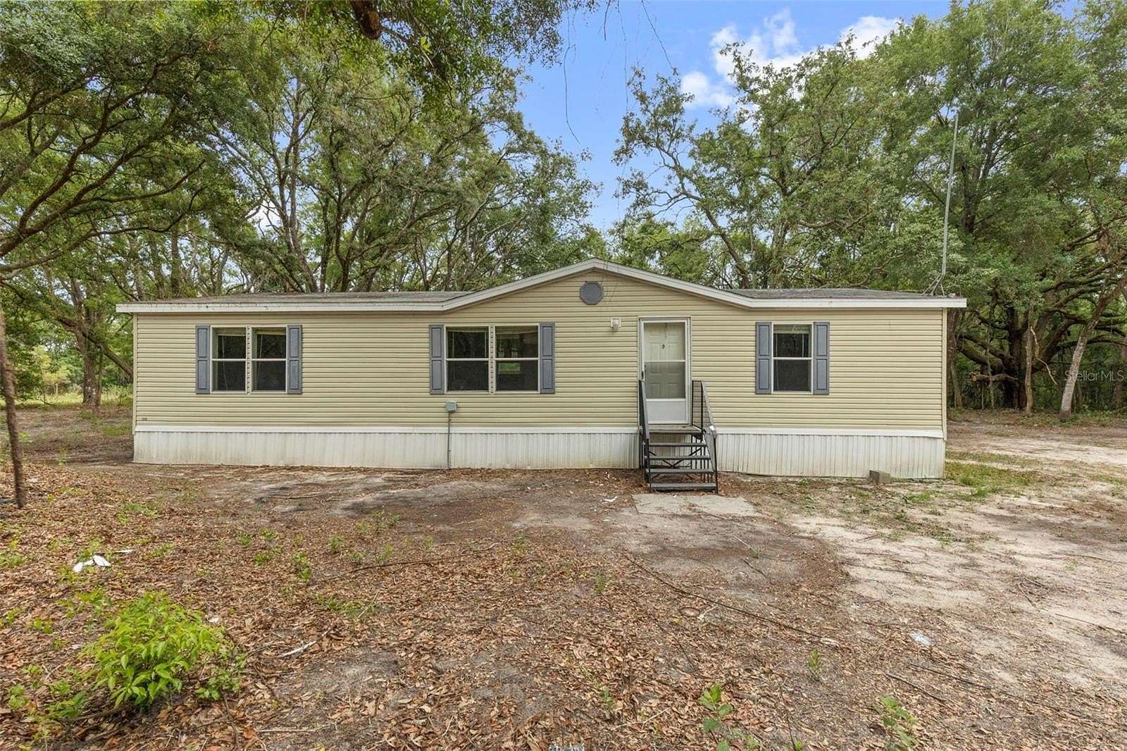 5 Acres of Land with Home for Sale in Spring Hill, Florida