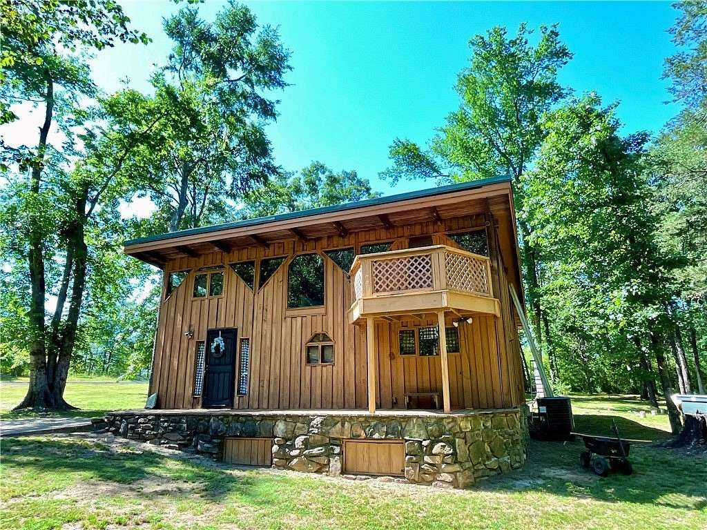 3 Acres of Land with Home for Sale in Clarksville, Arkansas