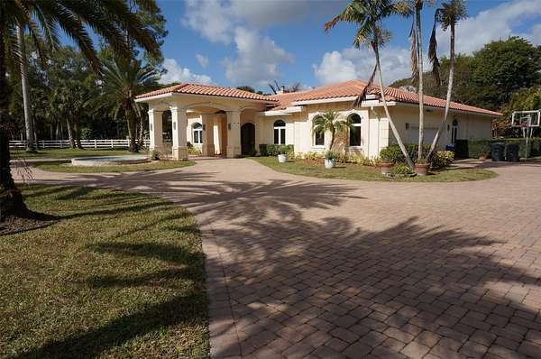 2 Acres of Land with Home for Sale in Wellington, Florida