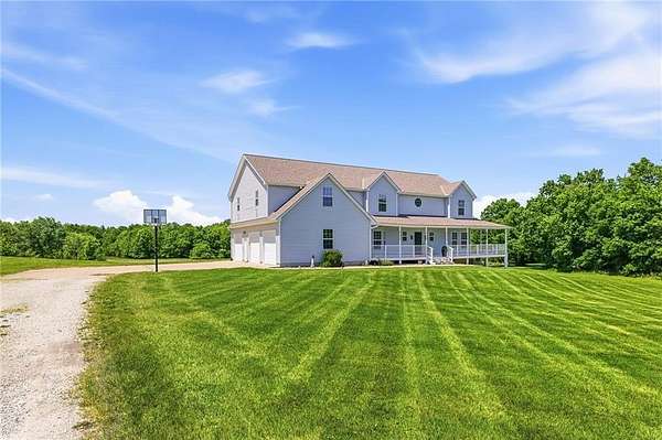 21 Acres of Recreational Land with Home for Sale in Lone Jack, Missouri