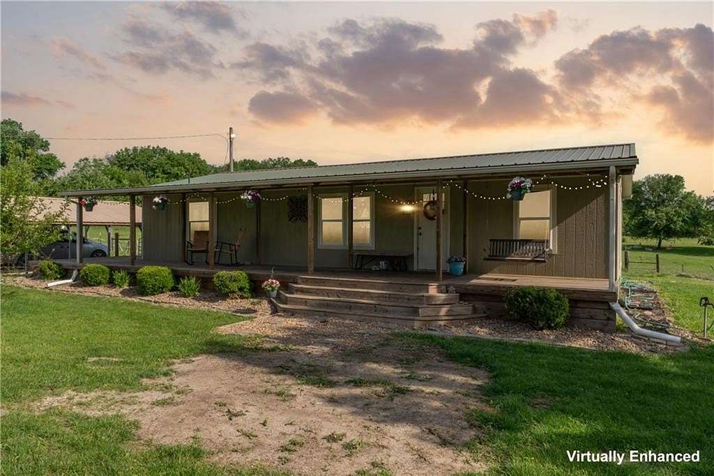 5 Acres of Land with Home for Sale in Pleasant Hill, Missouri