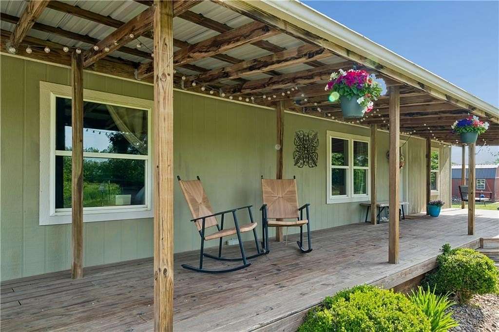 5 Acres of Land with Home for Sale in Pleasant Hill, Missouri