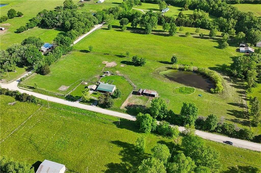 5 Acres of Land with Home for Sale in Pleasant Hill, Missouri