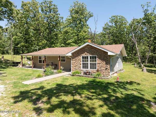 18 Acres of Recreational Land with Home for Sale in Baxter Springs, Kansas