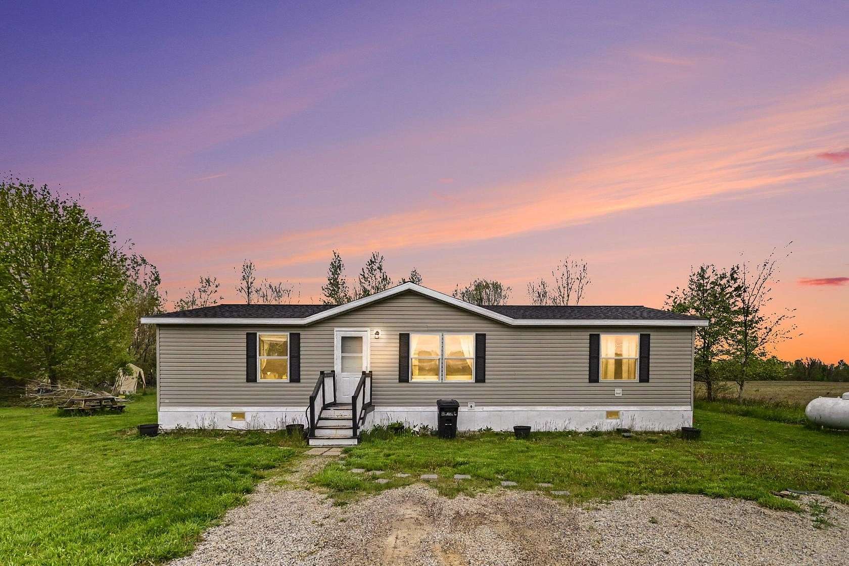 2 Acres of Land with Home for Sale in Portland, Michigan