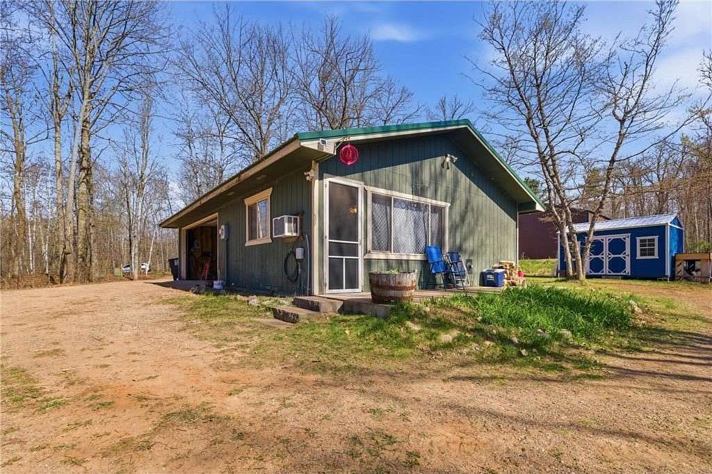 0.77 Acres of Land with Home for Sale in Emily, Minnesota