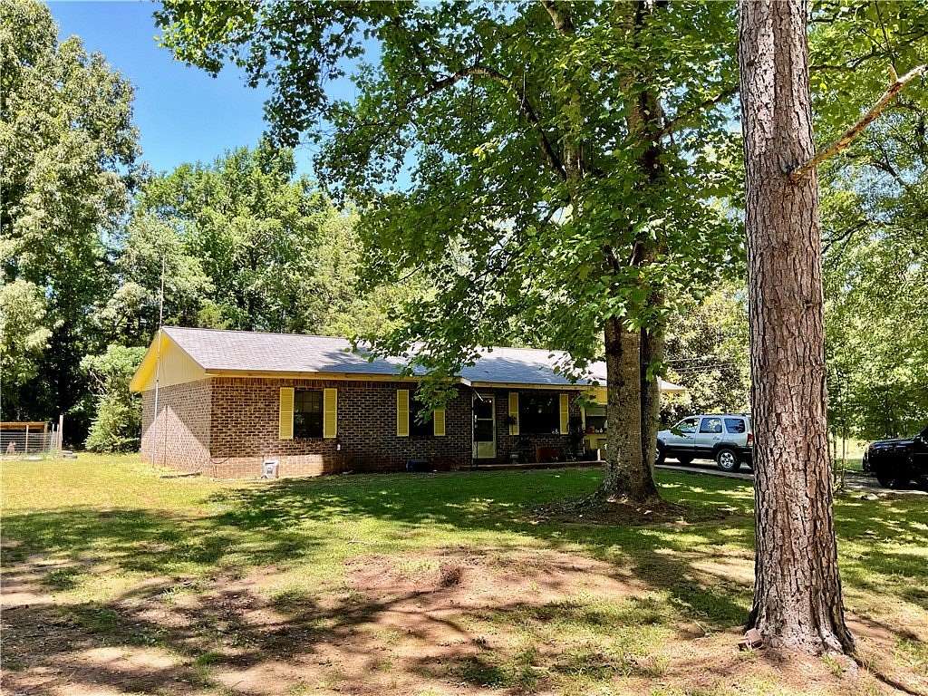 2.64 Acres of Land with Home for Sale in Clarksville, Arkansas