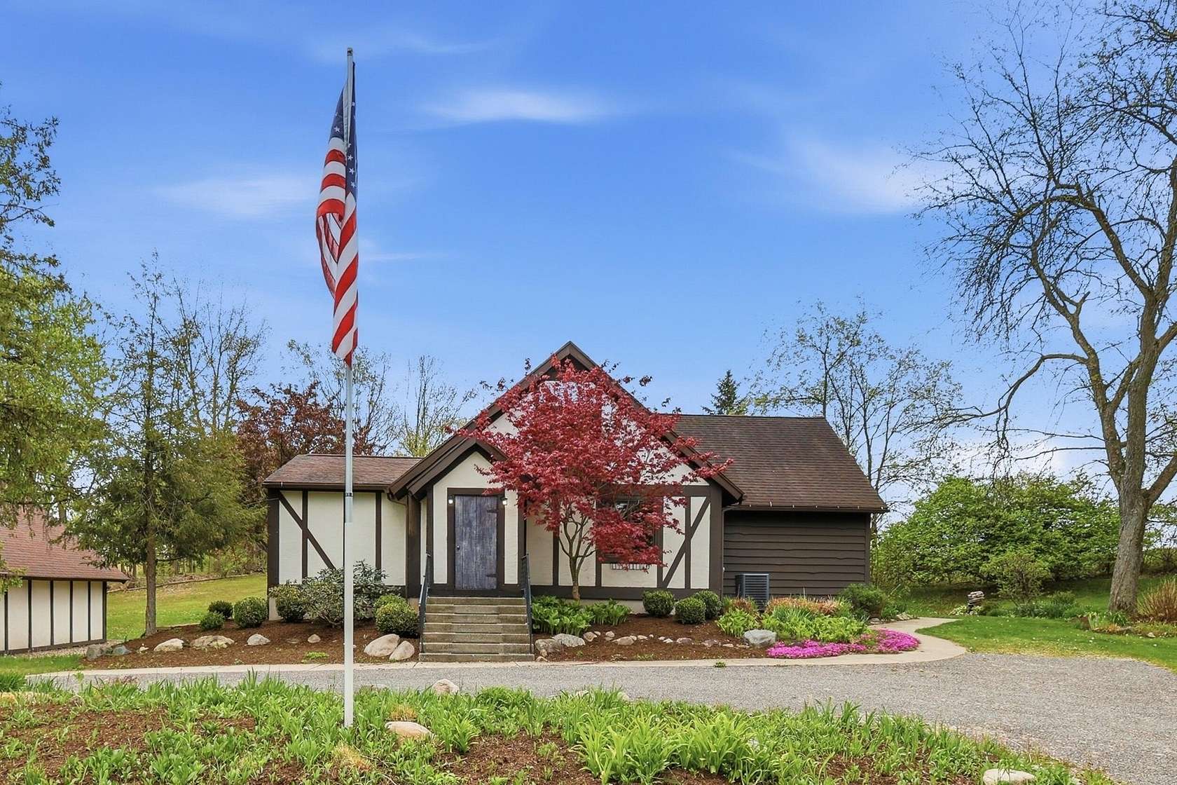 2.56 Acres of Land with Home for Sale in Rockford, Michigan