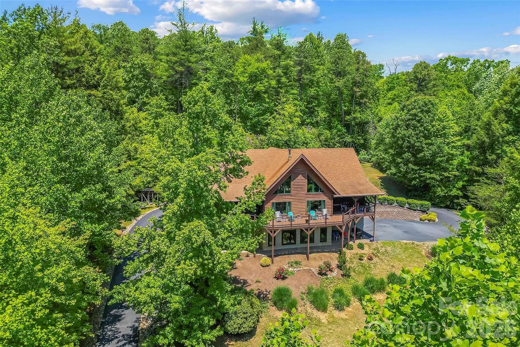 3.89 Acres of Land with Home for Sale in Zirconia, North Carolina