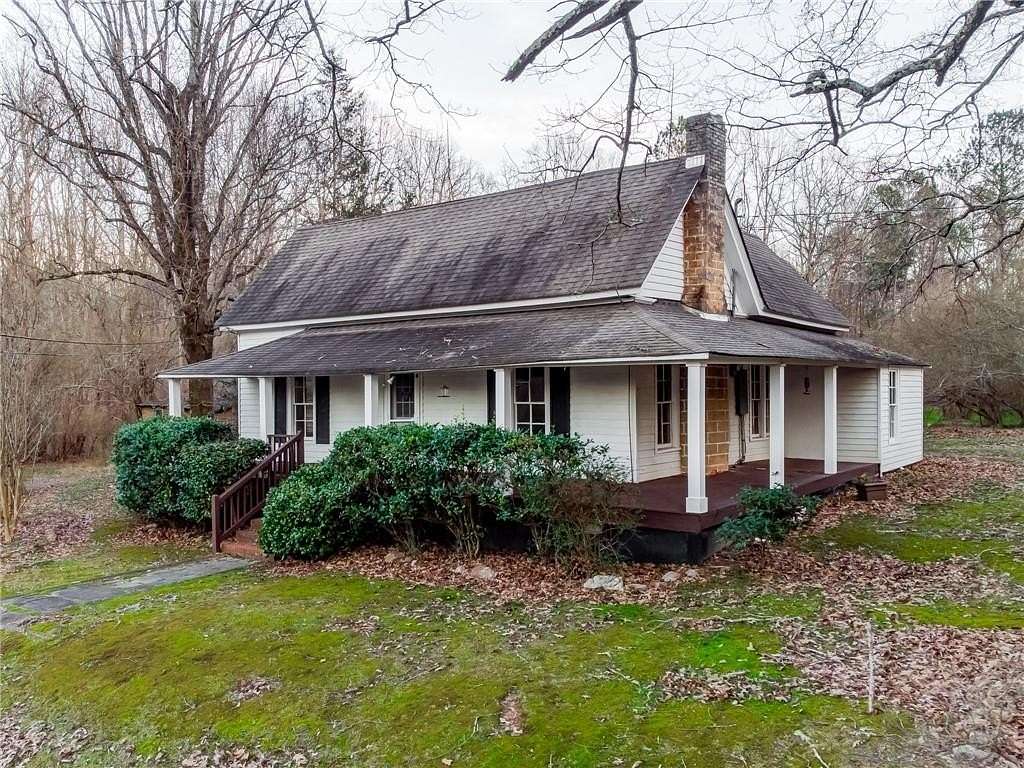2.24 Acres of Land with Home for Lease in Ball Ground, Georgia