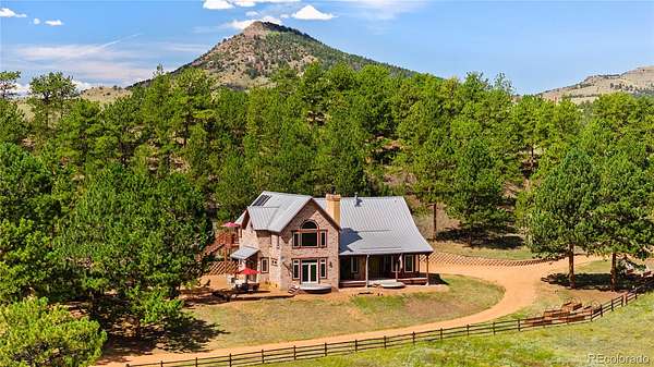 80 Acres of Land with Home for Sale in Guffey, Colorado