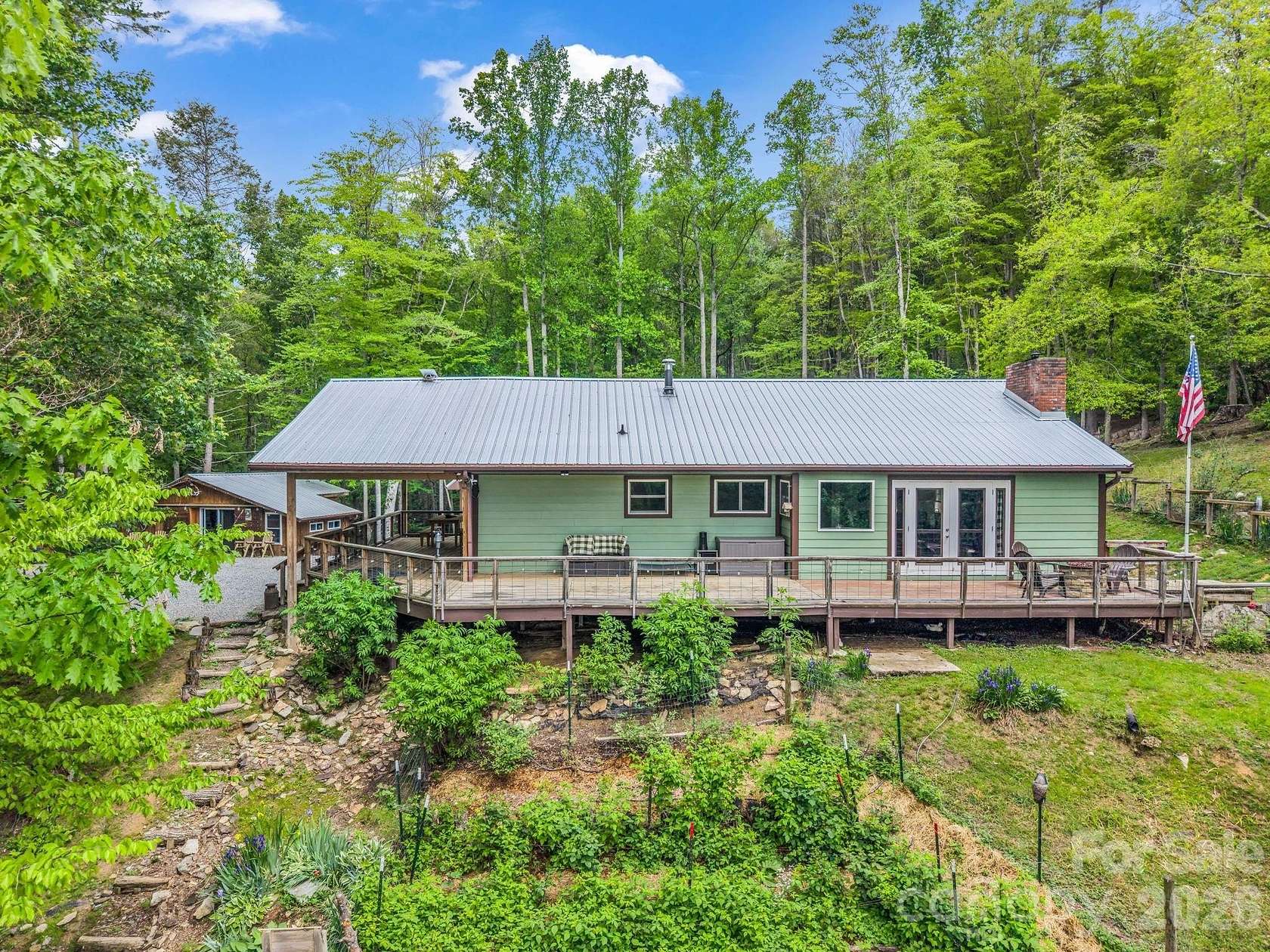 31.8 Acres of Land with Home for Sale in Green Mountain, North Carolina