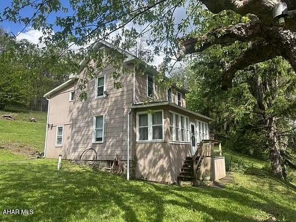 7.3 Acres of Land with Home for Sale in Duncansville, Pennsylvania