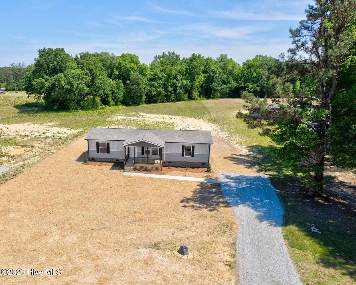 1.5 Acres of Land with Home for Sale in Castalia, North Carolina