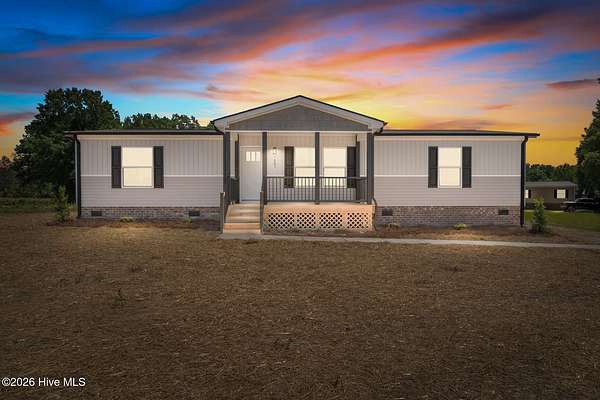 1.5 Acres of Land with Home for Sale in Castalia, North Carolina