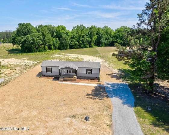 1.5 Acres of Land with Home for Sale in Castalia, North Carolina
