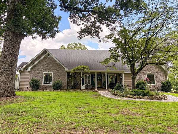 5.8 Acres of Land with Home for Sale in Scottsville, Kentucky
